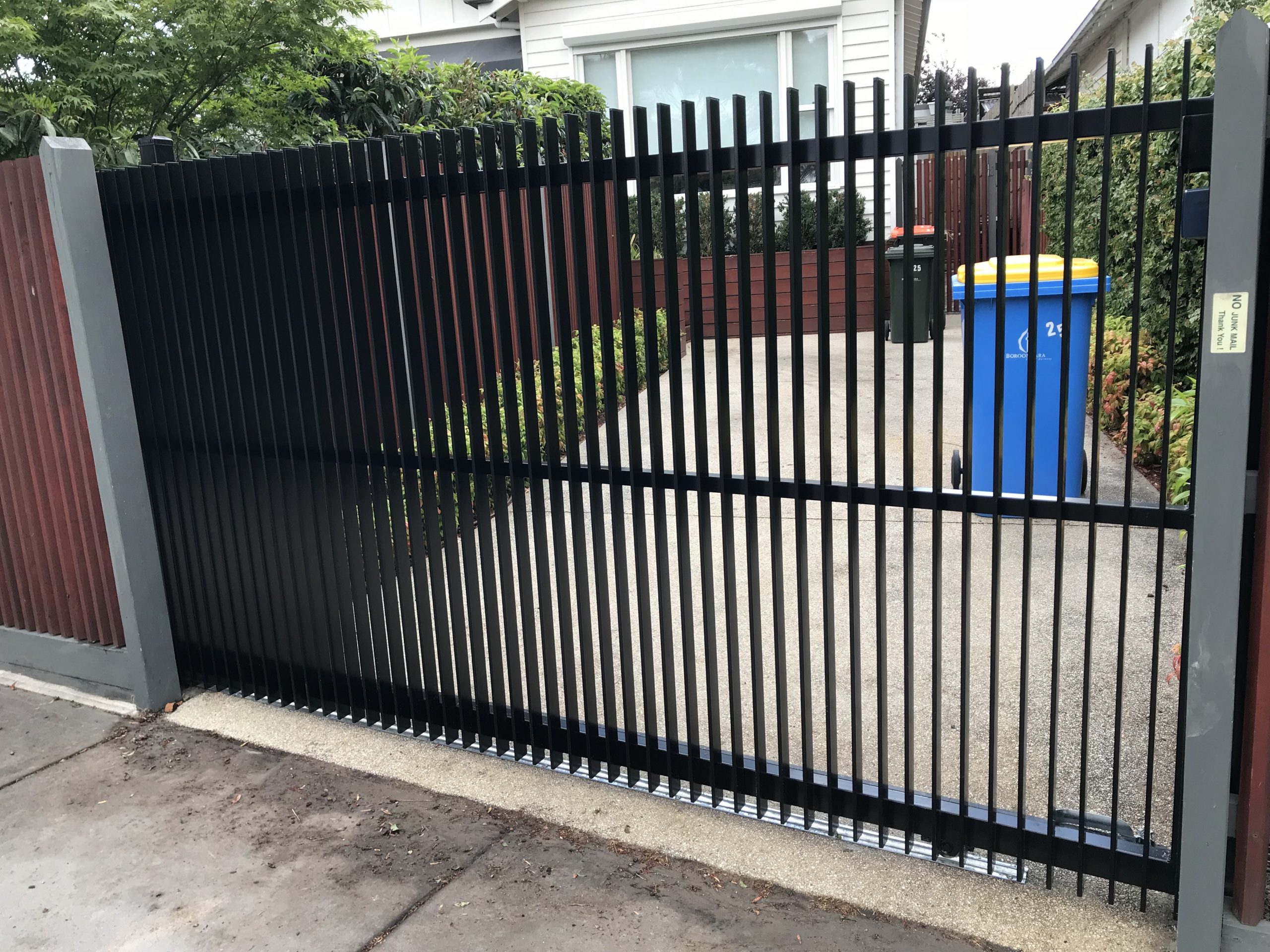 single panel automatic driveway gates